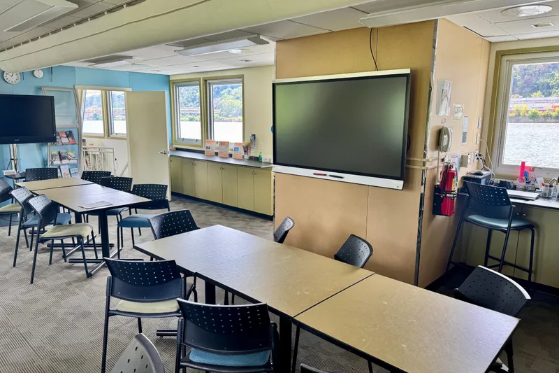 Slide: The Image of Modern research riverboat interior with tables, chairs, and large screens, 2016 model. - 8