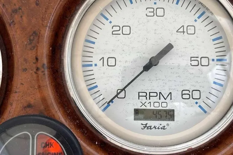 Slide: The Image of Close-up of a Faria RPM gauge on a 2005 Silverton 34 Convertible boat. - 21