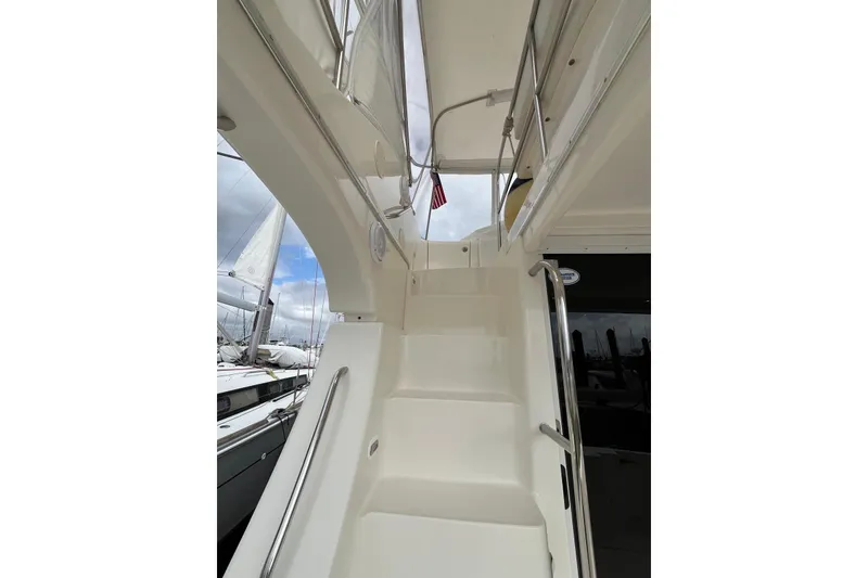 Slide: The Image of Staircase on 2005 Silverton 34 Convertible yacht with railing and overhead view. - 39