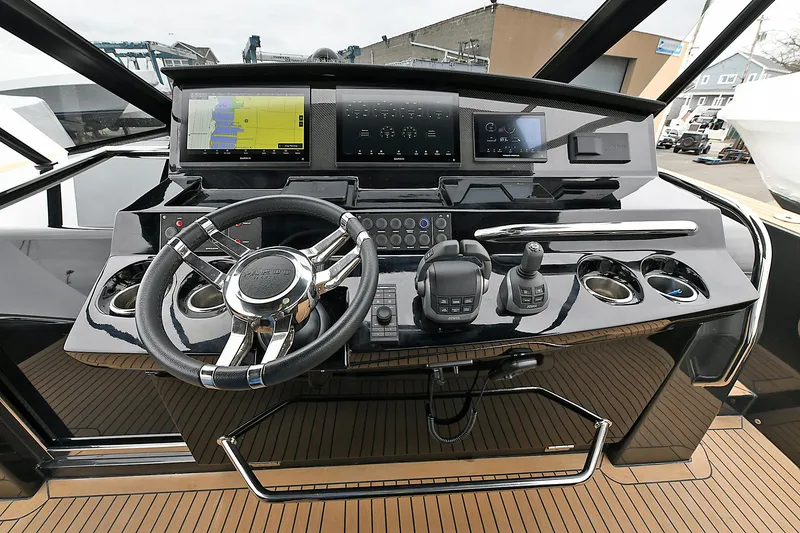 Slide: The Image of 2023 Pardo Yachts 43 helm with advanced navigation and control systems. - 16