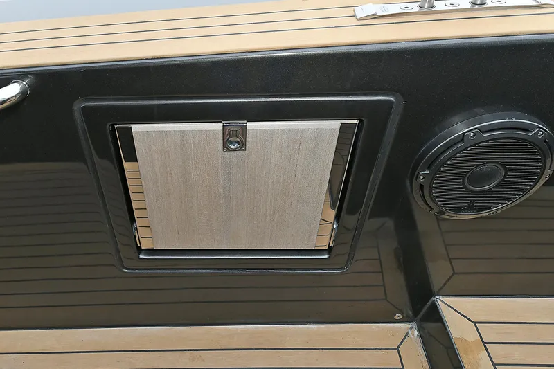 Slide: The Image of 2023 Pardo Yachts 43 interior detail with speaker and storage compartment. - 18