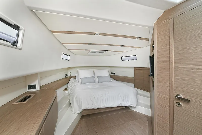 Slide: The Image of Luxurious cabin interior of 2023 Pardo Yachts 43, featuring a cozy bed and modern design. - 29