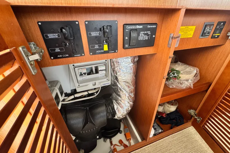 Slide: The Image of Electrical panel and storage inside 2017 Beneteau Swift Trawler 44 yacht. - 10