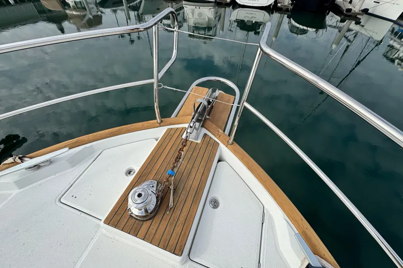 Slide: The Image of Bow of 2017 Beneteau Swift Trawler 44 with anchor and railing. - 5