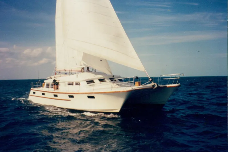 The Image of Sailing yacht on open sea, Custom model 60, 1985, with white sails. - 0
