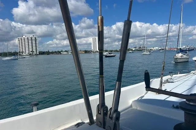 Slide: The Image of Sailboat deck view with city skyline, Custom 60 model, 1985. - 64