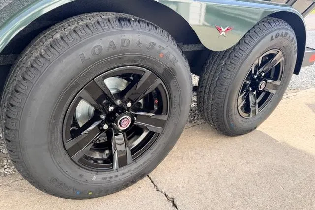 Slide: The Image of 2026 Vexus AVX1980 trailer with black alloy wheels and Loadstar tires. - 14