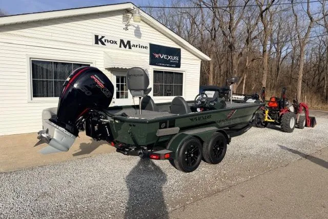 Slide: The Image of 2026 Vexus AVX1980 boat at Knox Marine dealership, parked on gravel driveway. - 3