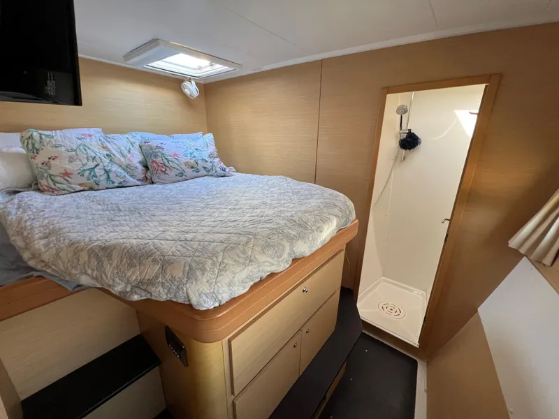 Slide: The Image of Lagoon 420 2008 model interior cabin with bed and ensuite bathroom. - 46