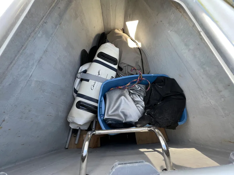 Slide: The Image of Storage compartment of a 2008 Lagoon 420 sailboat with equipment and gear. - 49