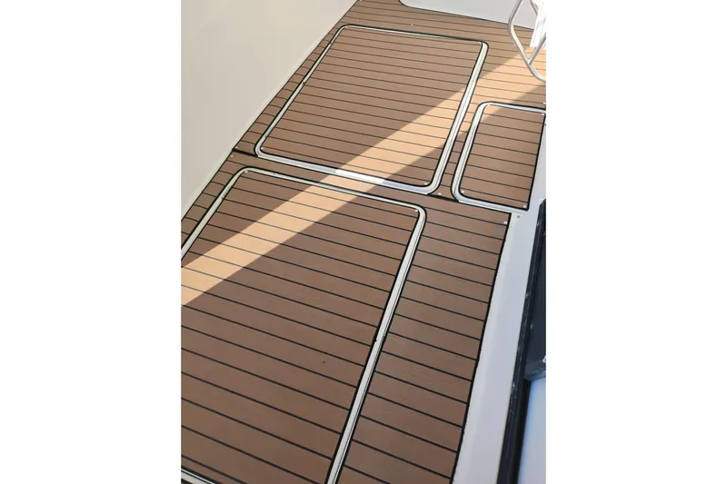 Slide: The Image of Bayliner 3988 Command Bridge Motoryacht 2000, teak deck detail, elegant marine flooring. - 18