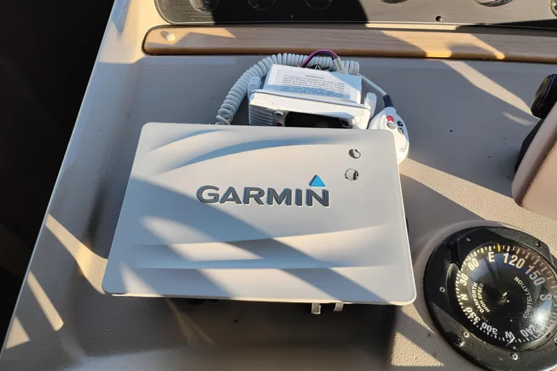 Slide: The Image of Garmin navigation system on 2000 Bayliner 3988 Command Bridge Motoryacht dashboard. - 39