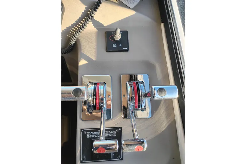 Slide: The Image of Control panel of 2000 Bayliner 3988 Command Bridge Motoryacht with throttle levers. - 40