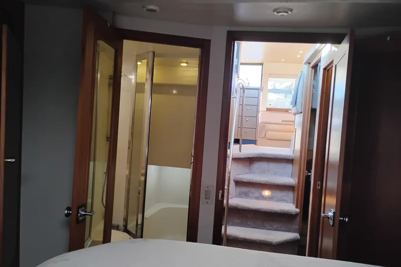 Slide: The Image of Interior of 2000 Bayliner 3988 Command Bridge Motoryacht with stairs and cabin view. - 54