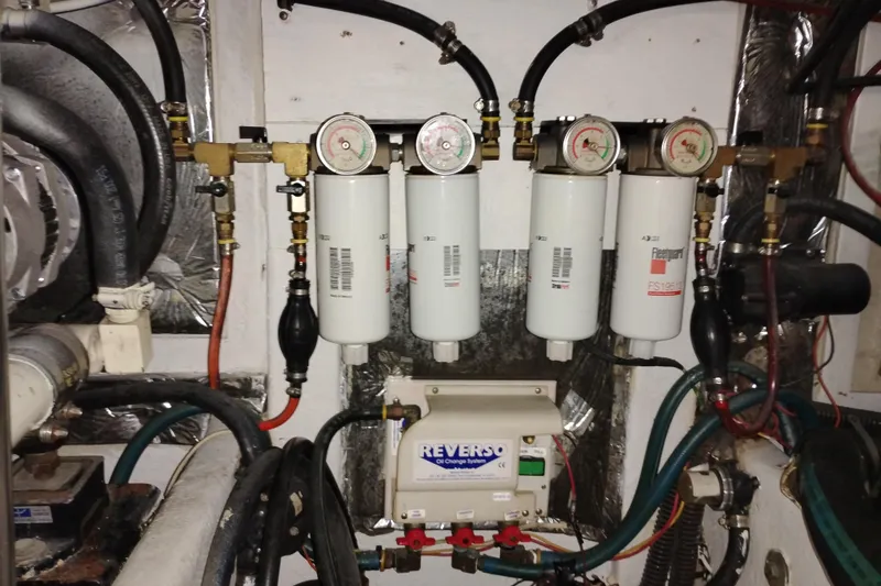 Slide: The Image of Engine room of 2000 Bayliner 3988 Command Bridge Motoryacht with fuel filtration system. - 62
