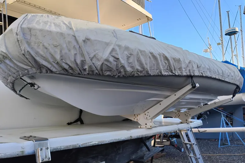 Slide: The Image of Covered boat on a 2000 Bayliner 3988 Command Bridge Motoryacht, docked with clear sky. - 68