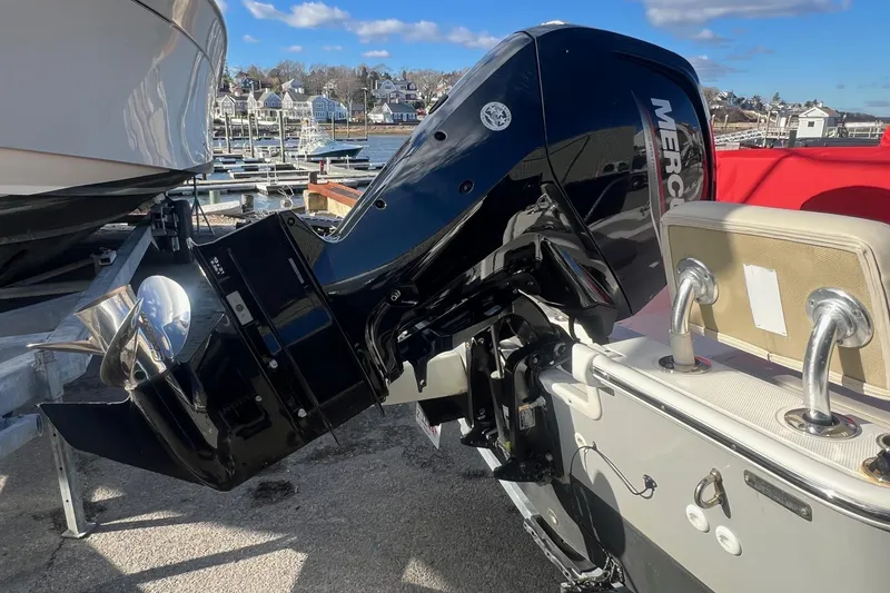 Slide: The Image of 2023 Boston Whaler 170 Montauk with Mercury outboard engine at marina. - 5