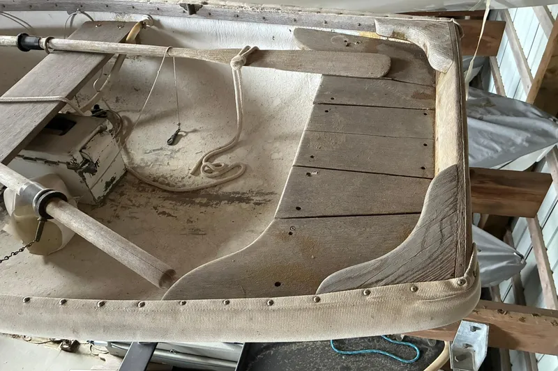 Slide: The Image of Vintage 1990 FAIRFIELD row boat with wooden oars and rustic interior. - 4