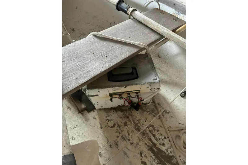 Slide: The Image of 1990 FAIRFIELD row boat interior with wooden seat and ropes. - 5