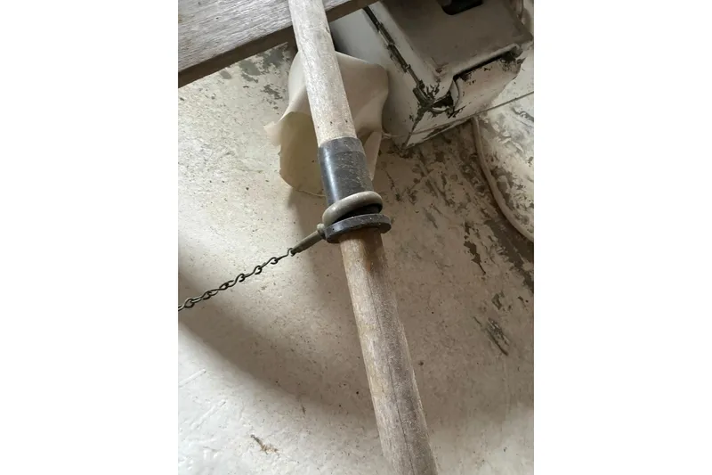 Slide: The Image of 1990 FAIRFIELD row boat oar with metal ring and chain attachment. - 8