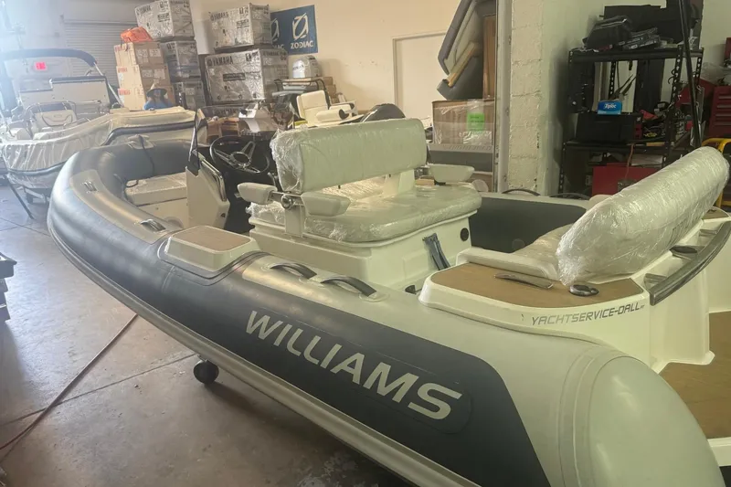 The Image of 2023 Williams Jet Tenders Dieseljet 445 in a workshop, wrapped seats, ready for use. - 0
