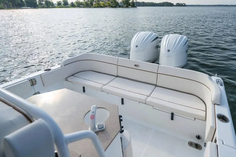 Slide: The Image of 2025 Sea Hunt Escape 28 boat interior bathroom with modern fixtures and compact design. - 5