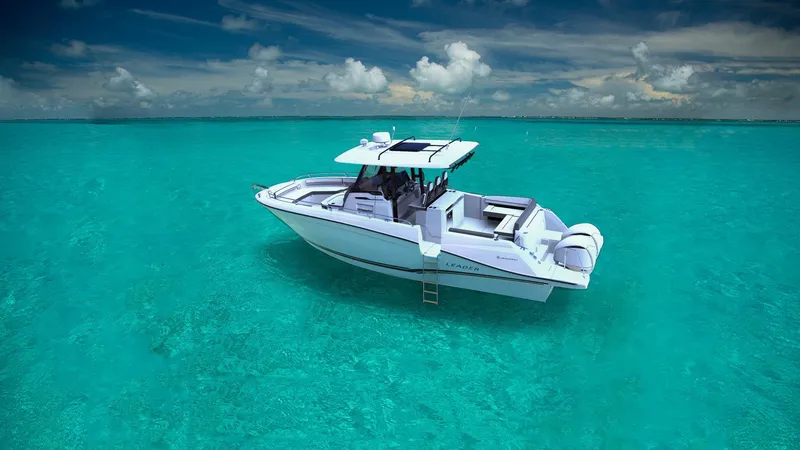 Slide: The Image of 2024 Jeanneau Leader 10.5CC boat on clear turquoise water under a partly cloudy sky. - 6