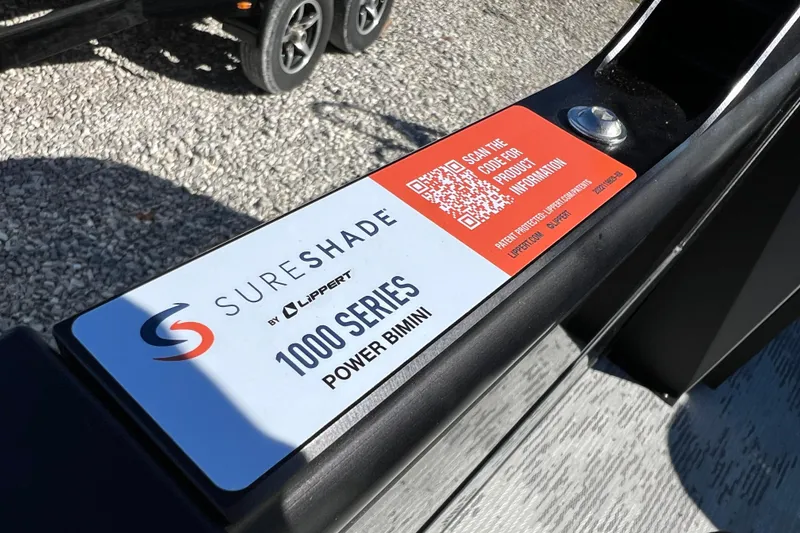 Slide: The Image of SureShade 1000 Series Power Bimini label on 2026 Sylvan R22 CLZ DH boat. - 12