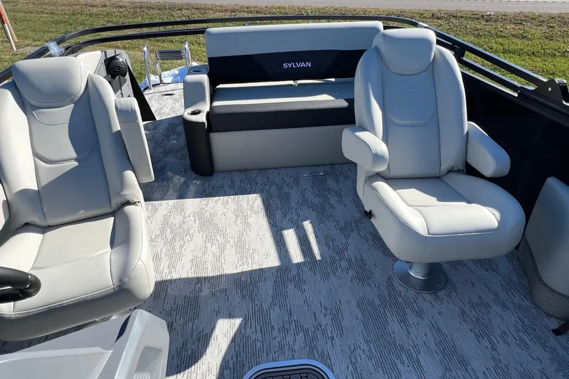 Slide: The Image of 2026 Sylvan R22 CLZ DH boat interior with plush seating and modern design. - 14