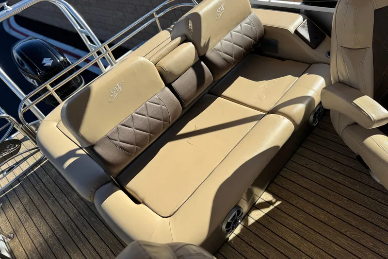 Slide: The Image of Luxurious seating on 2022 Silver Wave 2410 SW5 JS boat with tan upholstery. - 16