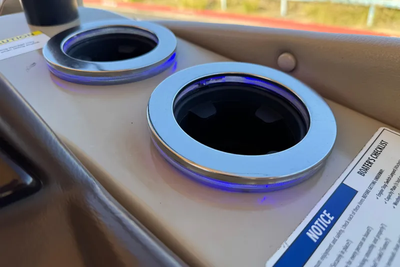 Slide: The Image of Cup holders with blue LED lights on 2022 Silver Wave 2410 SW5 JS boat. - 21