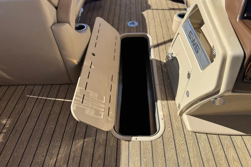 Slide: The Image of Open storage compartment on 2022 Silver Wave 2410 SW5 JS boat deck. - 22