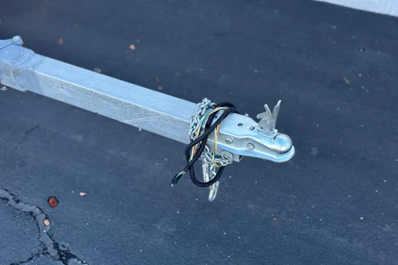 Slide: The Image of Trailer hitch of 2022 Silver Wave 2410 SW5 JS on asphalt surface. - 28