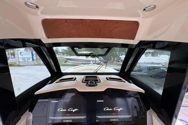 Slide: The Image of Interior view of 2020 Chris-Craft Catalina 30 boat with Garmin navigation system. - 35