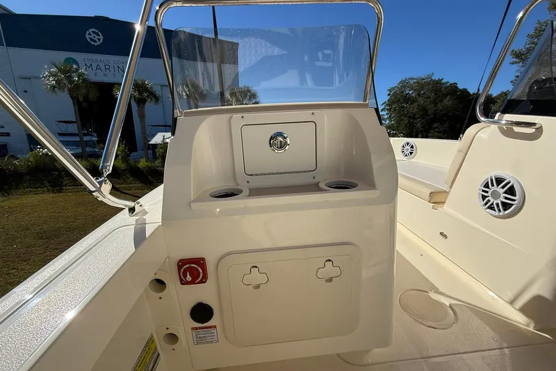 Slide: The Image of 2026 Scout 188 Sport Dorado boat interior with console and cup holders. - 10