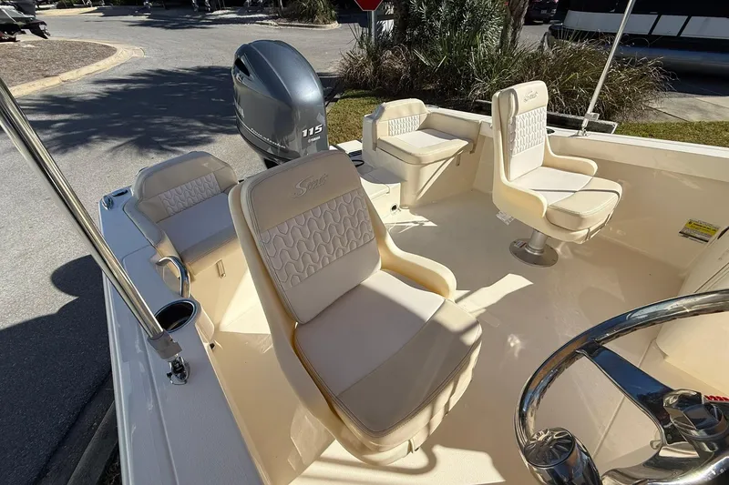 Slide: The Image of 2026 Scout 188 Sport Dorado boat interior with comfortable seating and Yamaha 115 engine. - 12