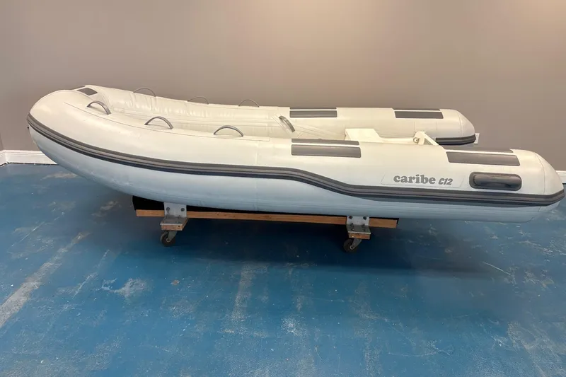 The Image of Inflatable Caribe C-12 boat, 2024 model, displayed at aiBoats showroom. - 0