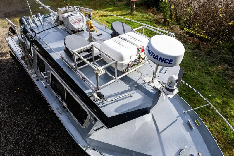 Slide: The Image of 2021 KingFisher 2825 Coastal Express boat with advanced navigation equipment on deck. - 44