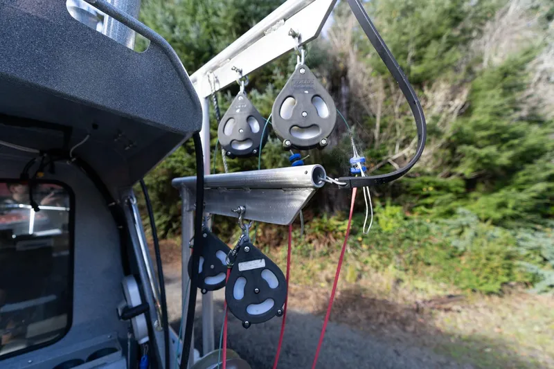 Slide: The Image of Fishing equipment on a 2021 KingFisher 2825 Coastal Express boat. - 47