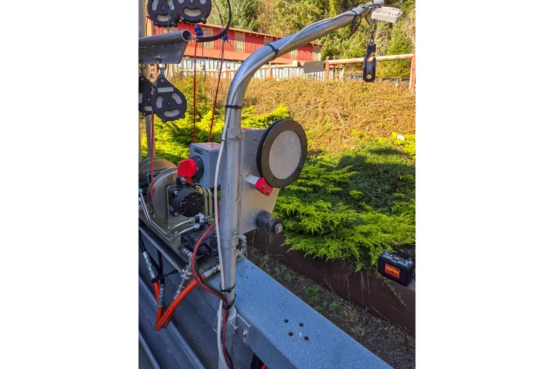 Slide: The Image of 2021 KingFisher 2825 Coastal Express boat equipment with cables and control panel. - 56