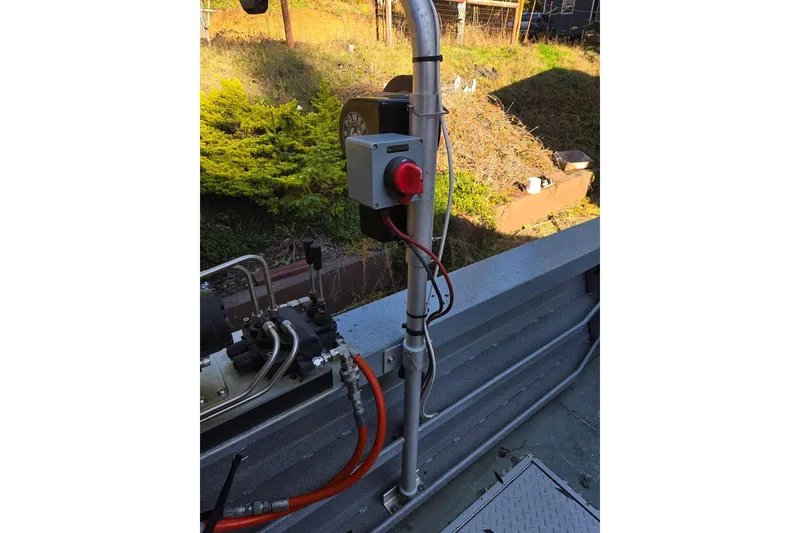 Slide: The Image of Control panel on 2021 KingFisher 2825 Coastal Express boat, featuring hydraulic system components. - 63