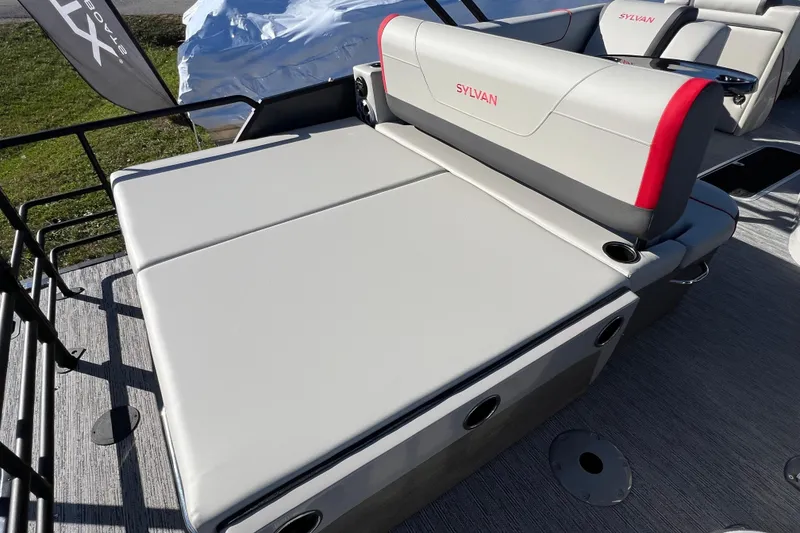 Slide: The Image of 2026 Sylvan X3 DLZ Bar boat with luxurious seating and modern design. - 11