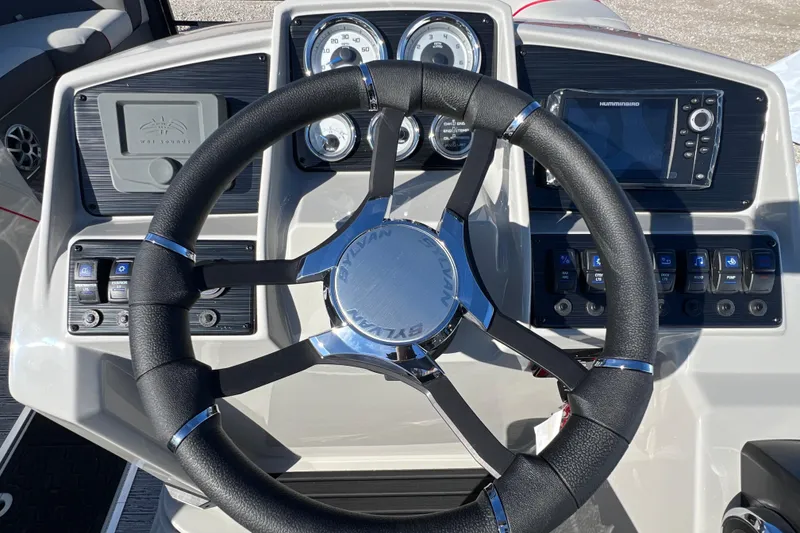 Slide: The Image of Steering wheel and dashboard of 2026 Sylvan X3 DLZ Bar boat. - 15