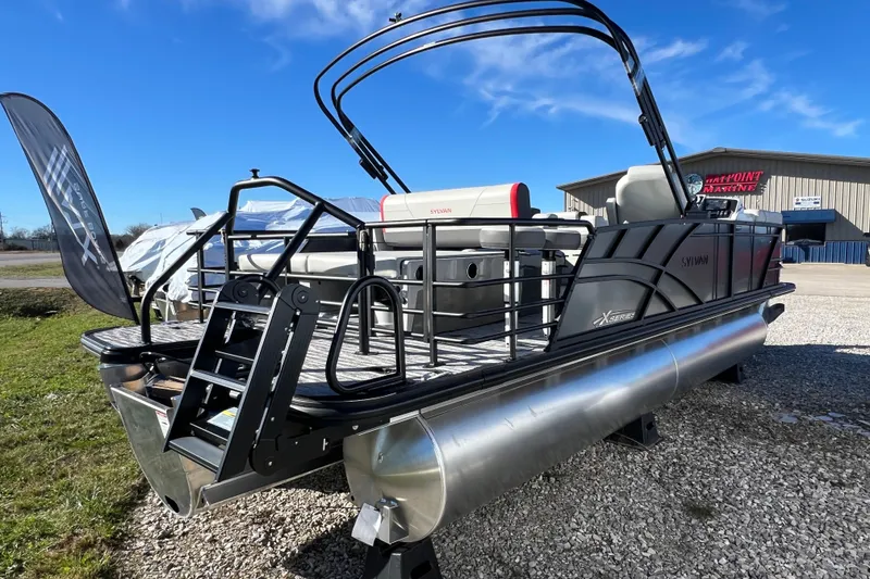 Slide: The Image of 2026 Sylvan X3 DLZ Bar pontoon boat with sleek design and modern features. - 3