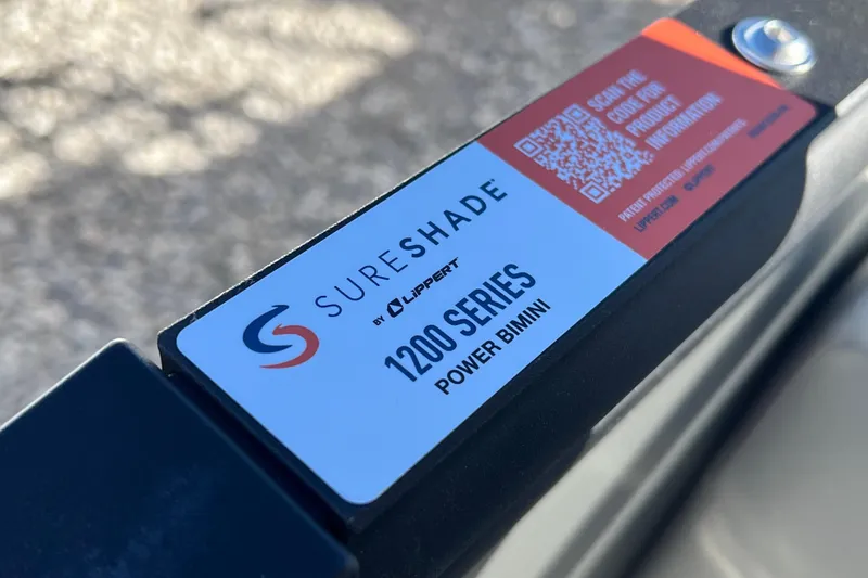 Slide: The Image of SureShade 1200 Series Power Bimini label on Sylvan X3 DLZ Bar, 2026 model. - 4