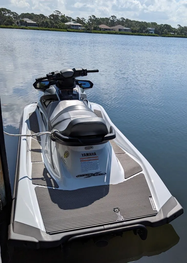 Slide: The Image of 2019 Yamaha WaveRunner VX Cruiser on a calm lake. - 4