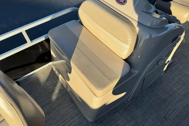 Slide: The Image of 2023 Ranger Reata 200F boat seat with beige upholstery and sleek design. - 15