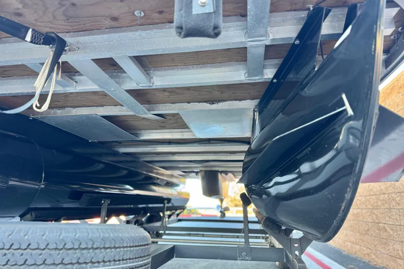 Slide: The Image of Underside view of 2023 Ranger Reata 200F boat trailer with black components. - 4