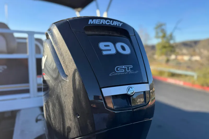 Slide: The Image of 2023 Ranger Reata 200F with Mercury 90 CT outboard motor, close-up view. - 8