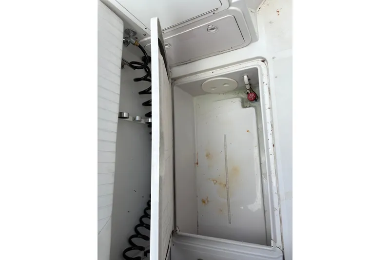 Slide: The Image of Open storage compartment on 2001 Glacier Bay 2690 Coastal Runner boat. - 35